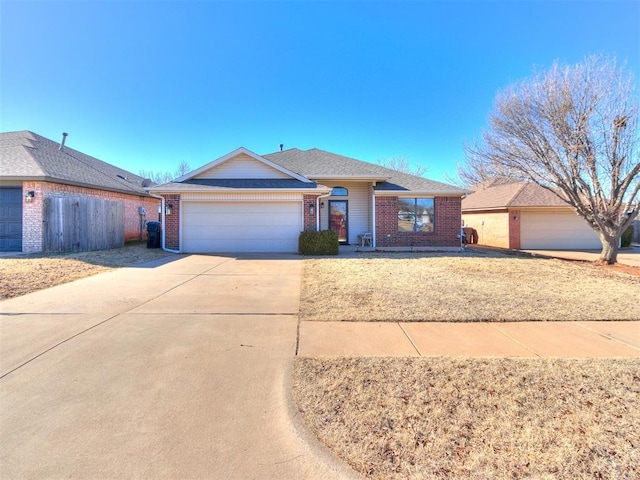 single story home featuring a garage