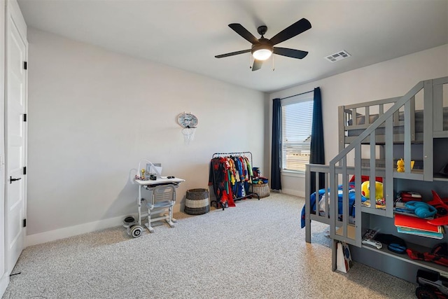 carpeted bedroom featuring ceiling fan