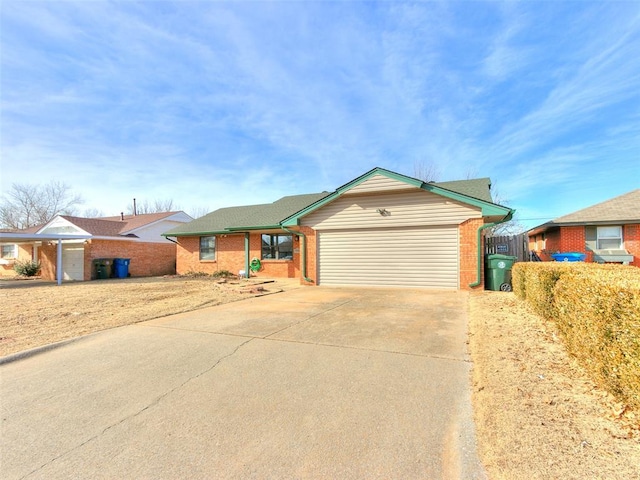 ranch-style house featuring a garage