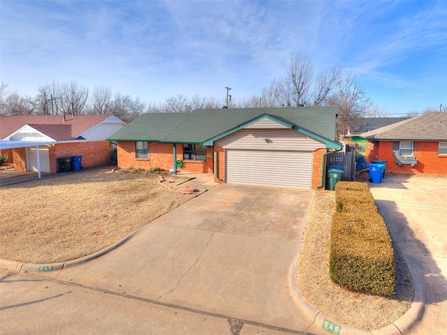 ranch-style home featuring a garage