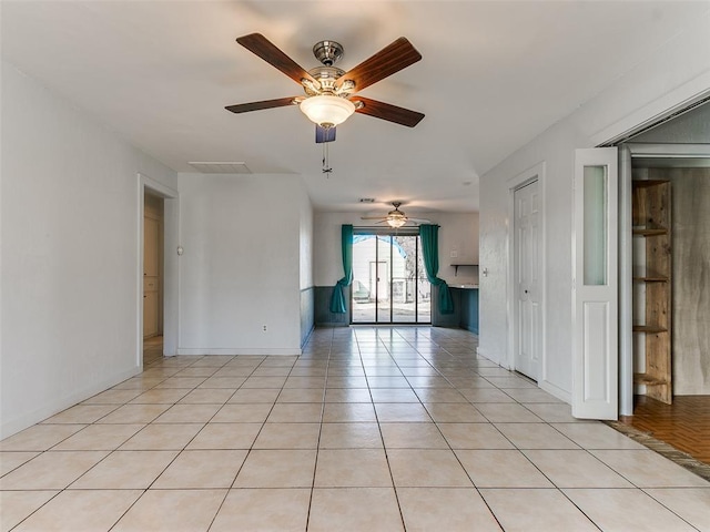 empty room with light tile patterned floors