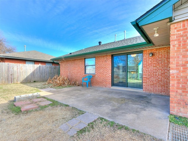 back of property featuring a patio