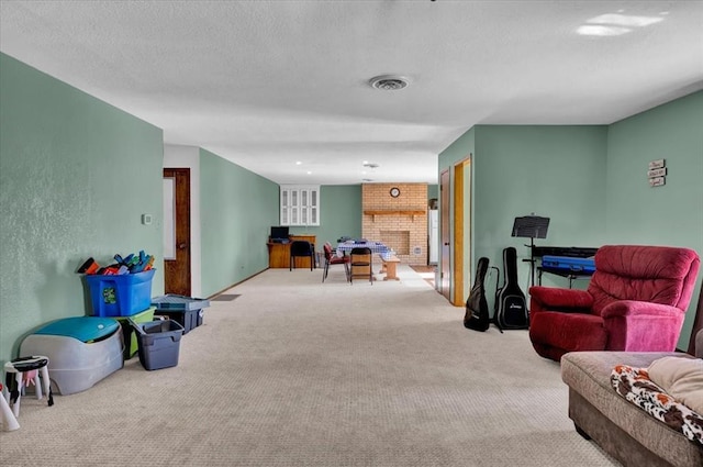 carpeted living room with a fireplace