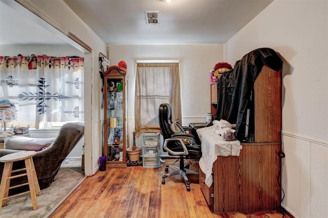 office space with hardwood / wood-style flooring