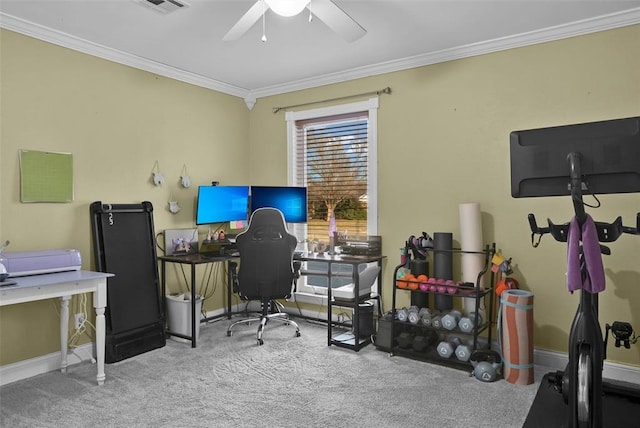 carpeted home office with crown molding and ceiling fan