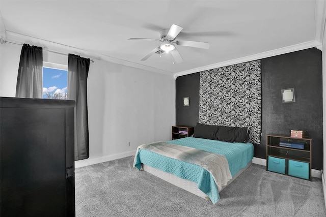 carpeted bedroom with ornamental molding and ceiling fan