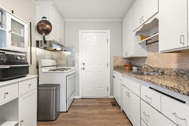 kitchen with under cabinet range hood, white appliances, a sink, white cabinets, and open shelves