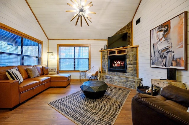 living room featuring high vaulted ceiling, a fireplace, hardwood / wood-style floors, and wooden ceiling