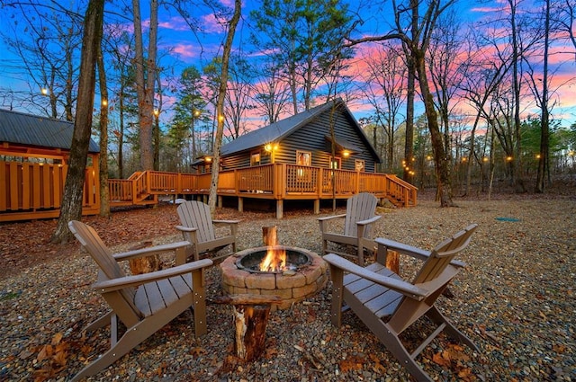 exterior space with a fire pit