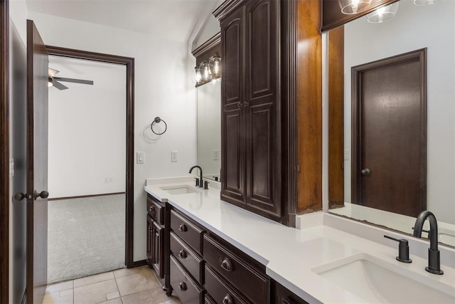 bathroom featuring tile patterned flooring and vanity