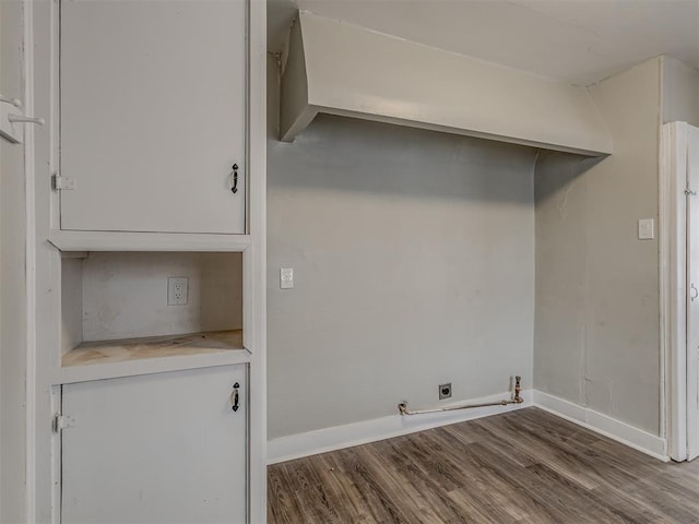 laundry room with hookup for a gas dryer and hardwood / wood-style floors