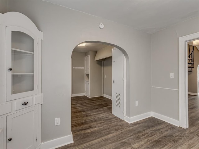 interior space with dark hardwood / wood-style flooring