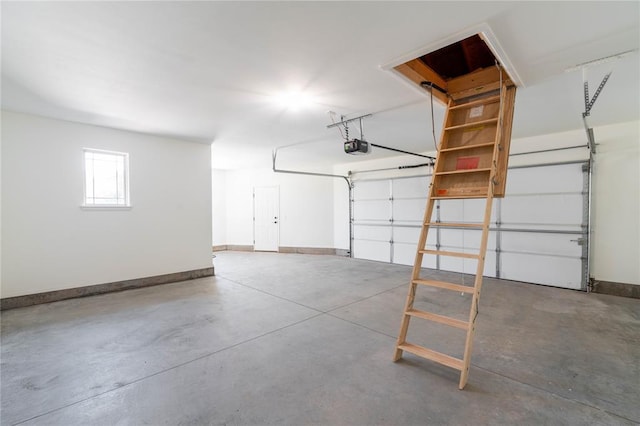 garage featuring a garage door opener