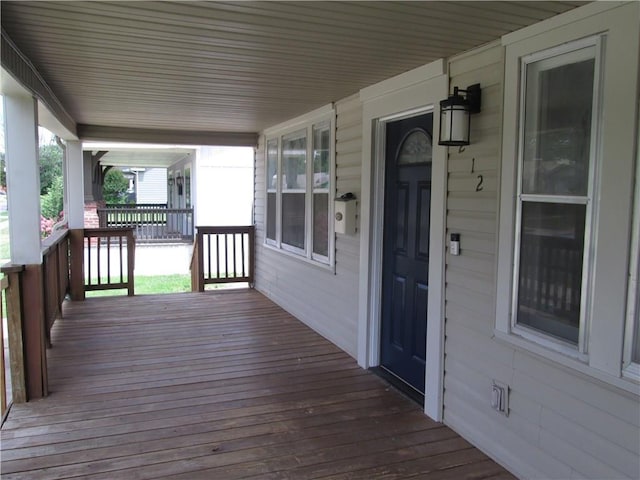 deck with covered porch