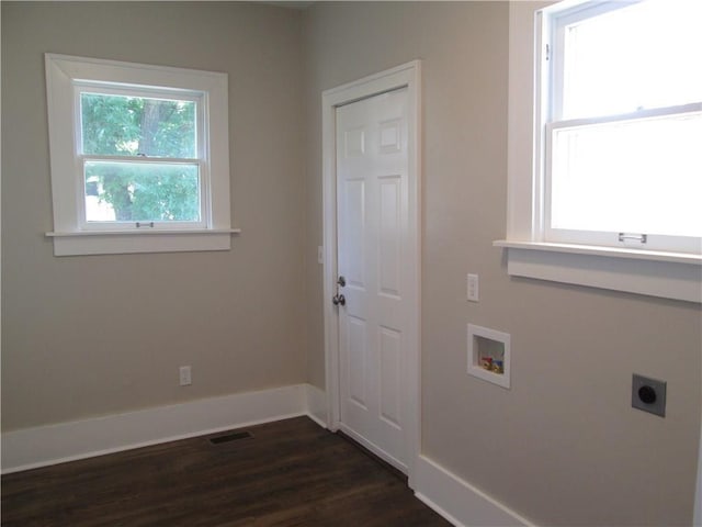 laundry room with dark wood-type flooring, washer hookup, and hookup for an electric dryer