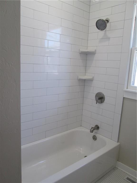 212 NE 15th St, Oklahoma City, OK 73104 - bathroom with baseboards and bathtub / shower combination
