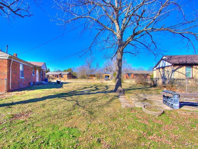 view of yard with fence