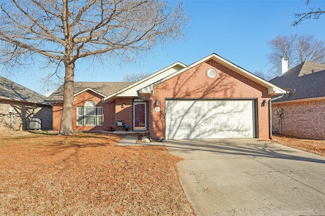 ranch-style house featuring a garage