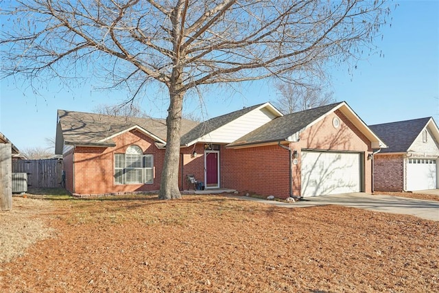 ranch-style home featuring a garage