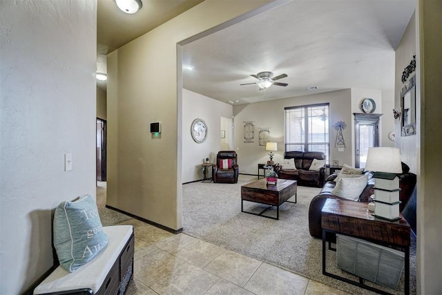 living room featuring ceiling fan and light carpet