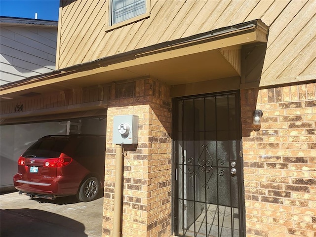 property entrance featuring a garage