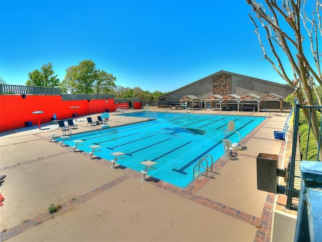 view of pool featuring a patio