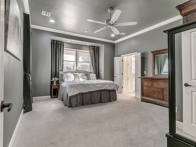 carpeted bedroom with crown molding, ceiling fan, and ensuite bathroom