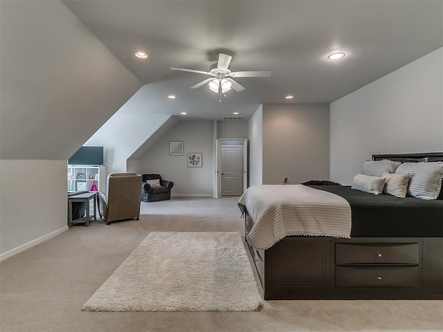 carpeted bedroom with lofted ceiling and ceiling fan