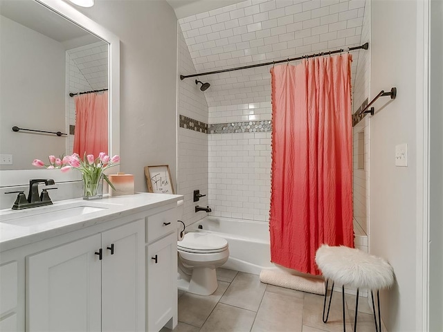 full bathroom featuring vanity, tile patterned floors, shower / bath combination with curtain, and toilet