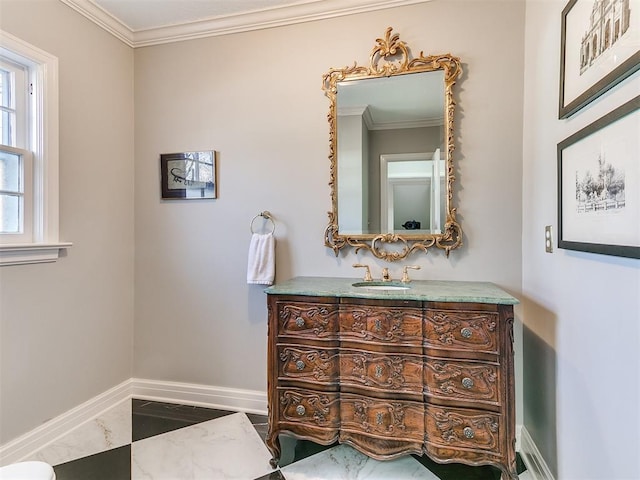 bathroom with crown molding and vanity