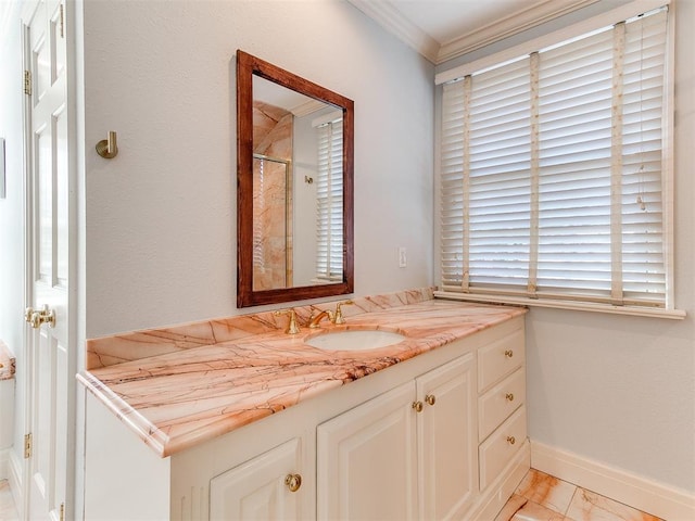 bathroom featuring vanity and ornamental molding