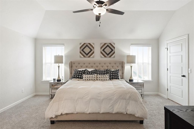 carpeted bedroom featuring lofted ceiling and ceiling fan