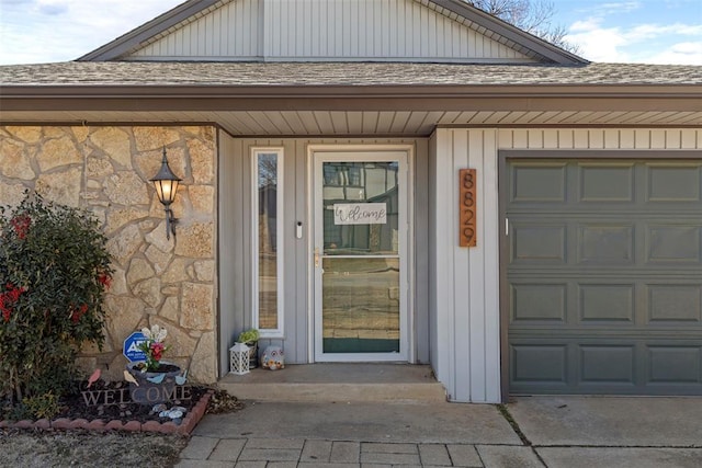 property entrance with a garage