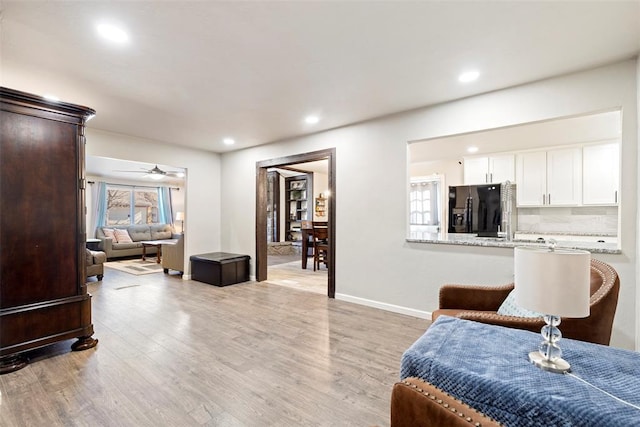 living room with light hardwood / wood-style floors