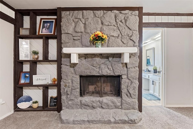 interior space with a fireplace and carpet