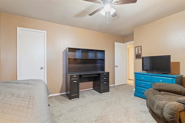 living room with ceiling fan and light colored carpet