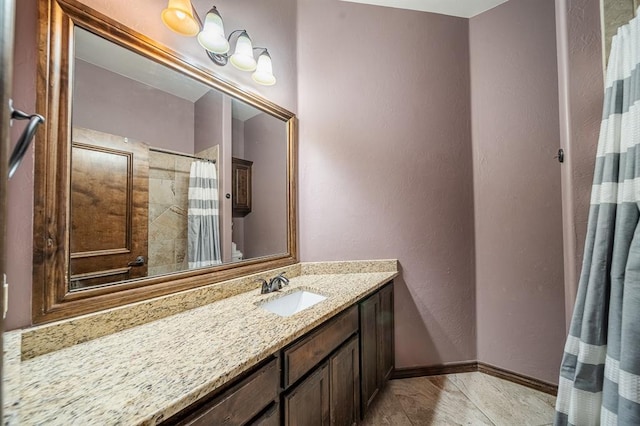 bathroom with vanity and curtained shower