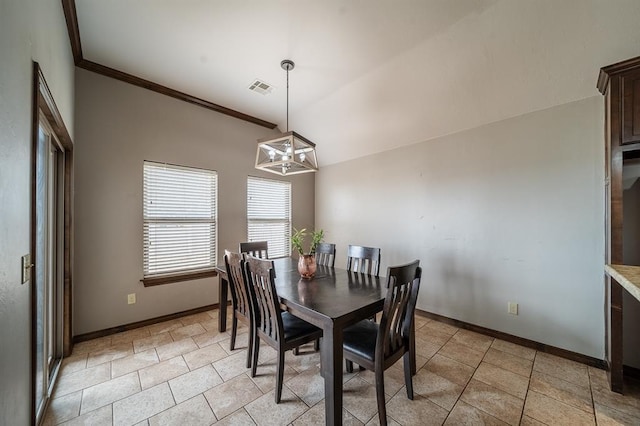 dining area featuring vaulted ceiling, ornamental molding, light tile patterned floors, and a notable chandelier