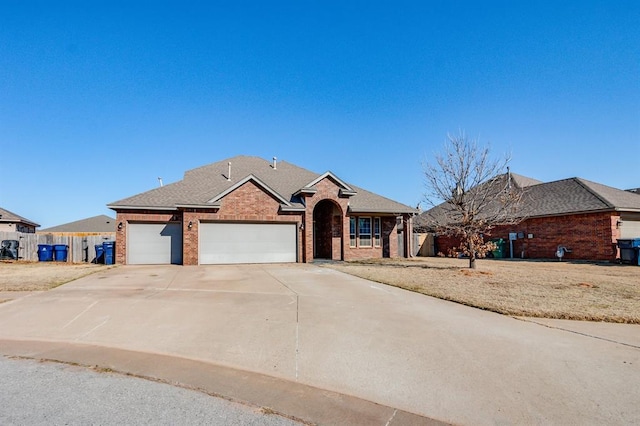 view of front of home with a garage