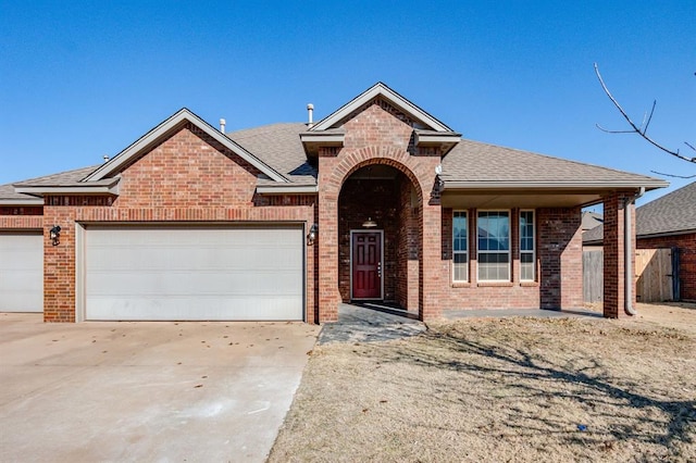 view of front of property featuring a garage