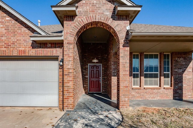 entrance to property featuring a garage