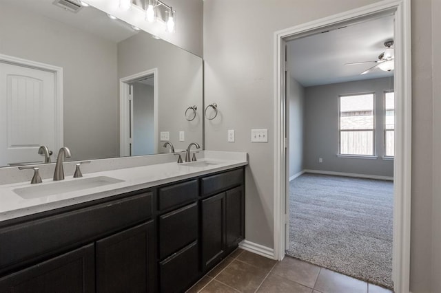 bathroom featuring vanity, tile patterned floors, and ceiling fan