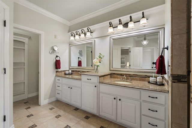 bathroom with vanity and crown molding