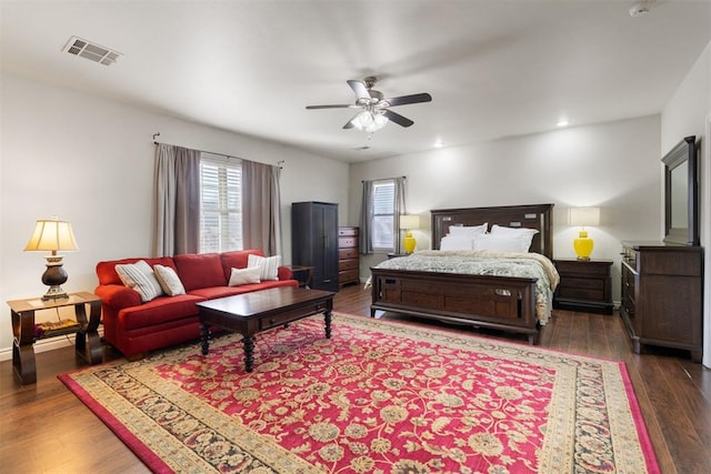 bedroom featuring dark wood-type flooring and ceiling fan