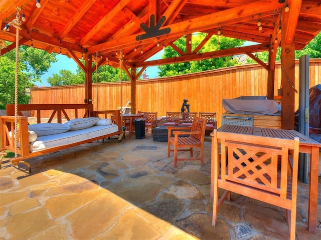 view of patio with a gazebo and outdoor lounge area