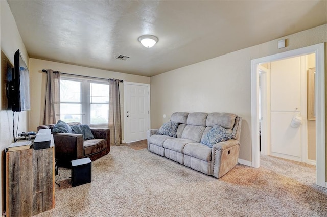 living room with light carpet