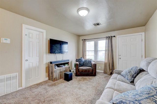 living room with light colored carpet