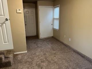 unfurnished bedroom featuring carpet floors