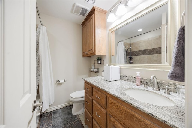 bathroom with vanity, toilet, and a shower with shower curtain