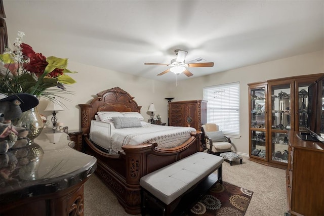 bedroom featuring ceiling fan and carpet floors